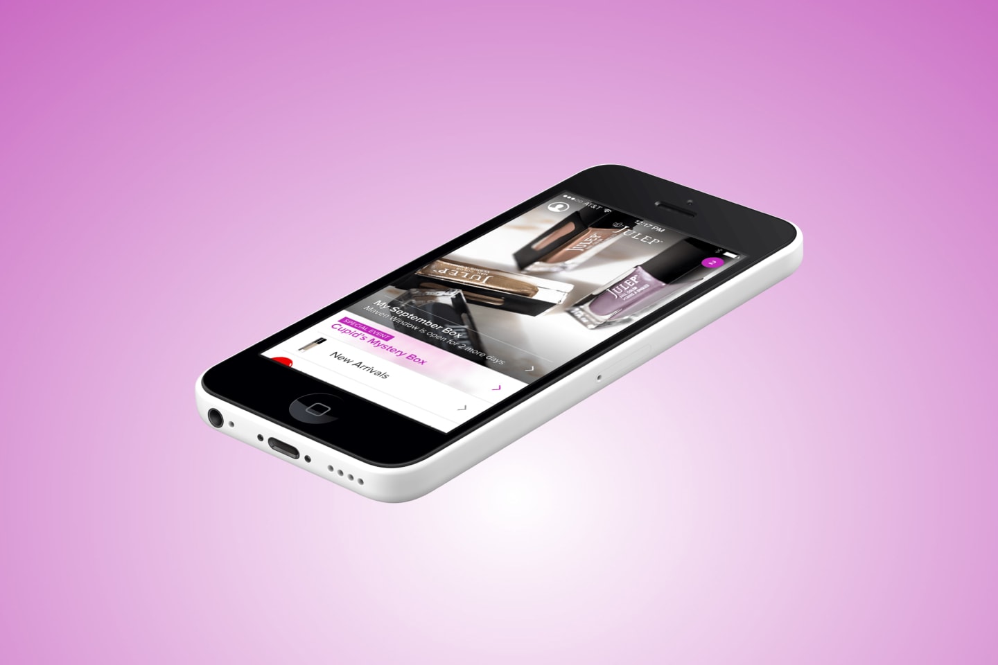 A phone displaying the Julep app while hovering above a pink background